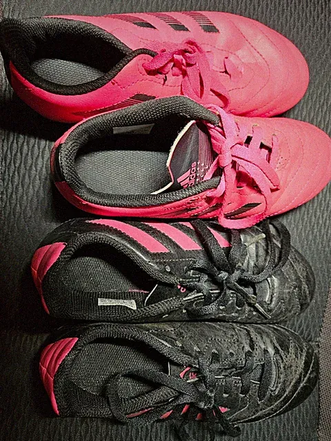 2 pairs of Adidas girls soccer cleats