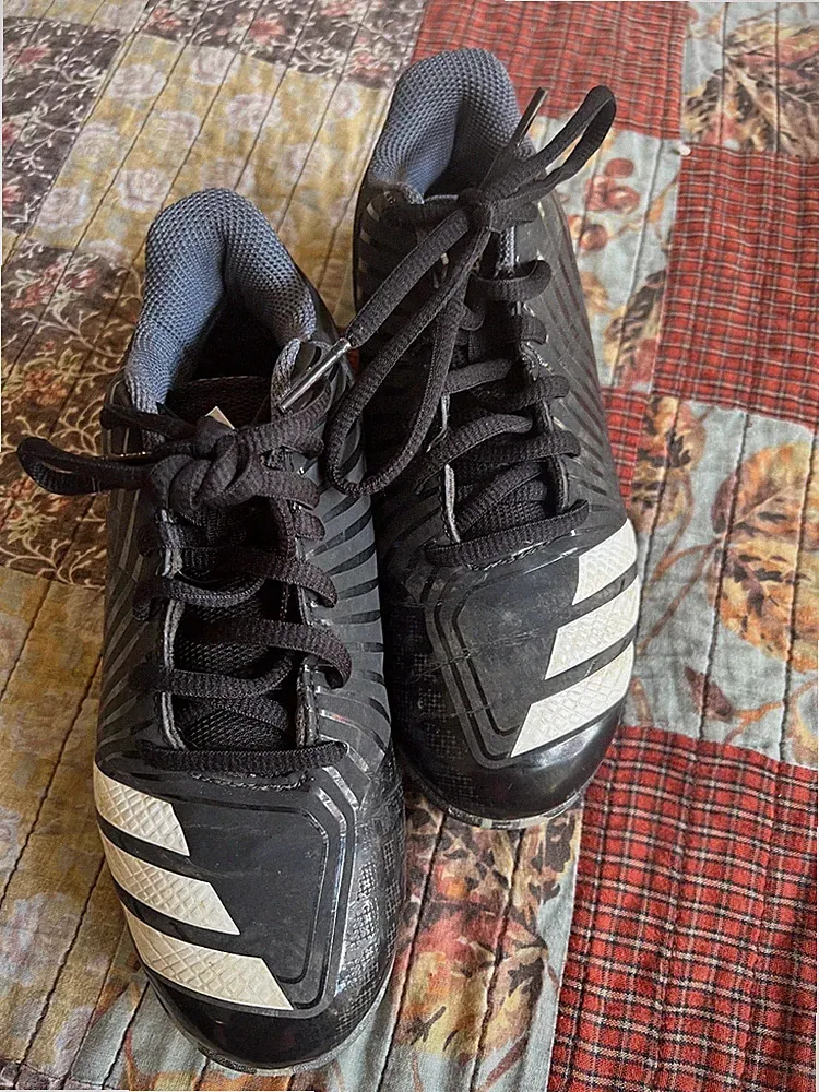 Adidas black and white soccer cleats