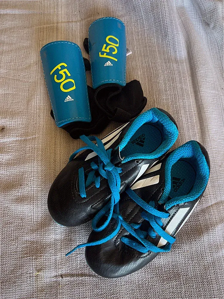 soccer cleats and shin guards set boys
