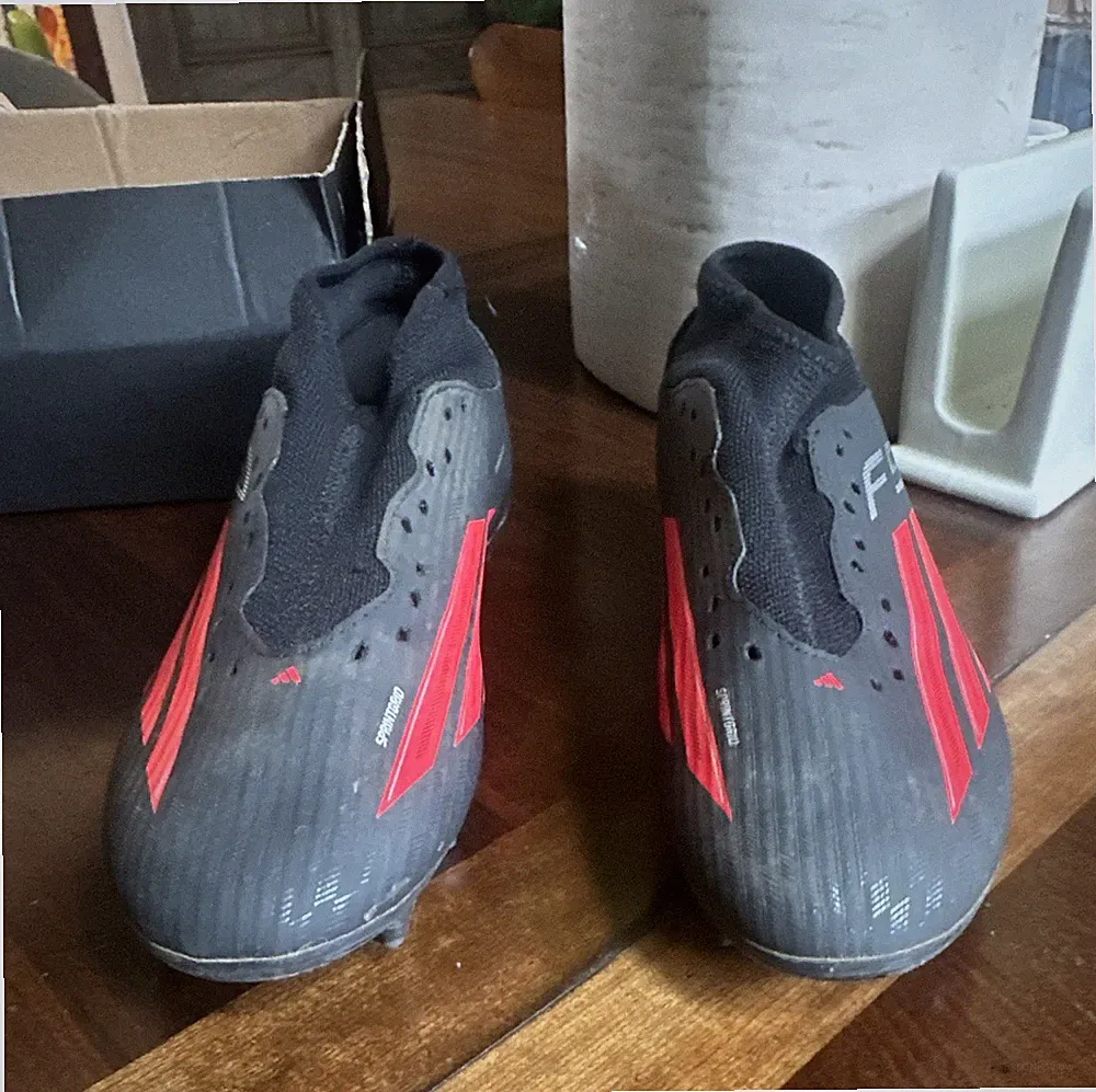 adidas F50 Men’s Soccer Cleats Black/Red Slip-On Mid Top Athletic Sneakers