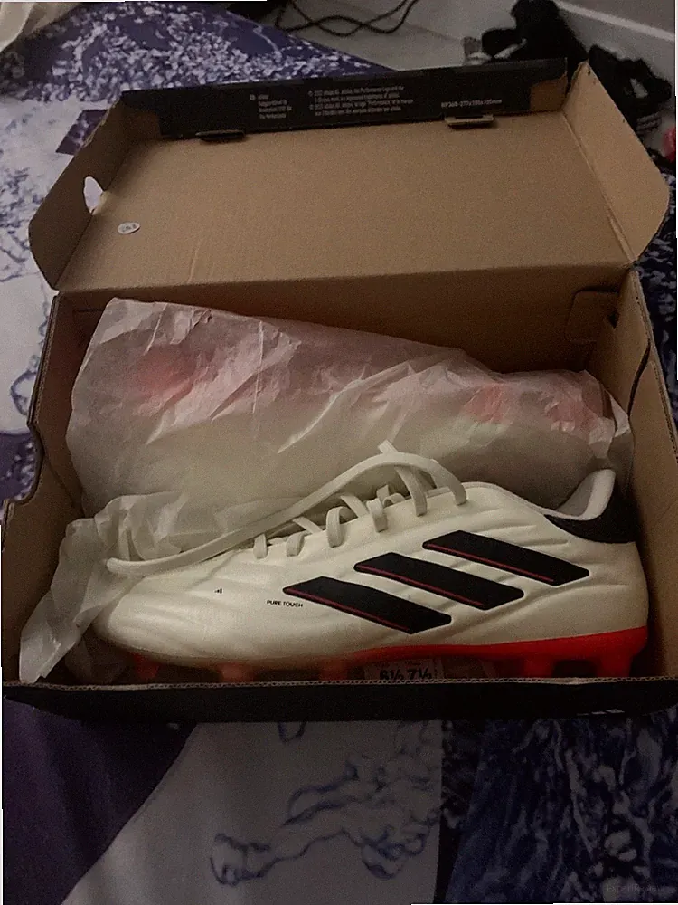 Adidas pro soccer cleats, leather material, beige color and sold with box