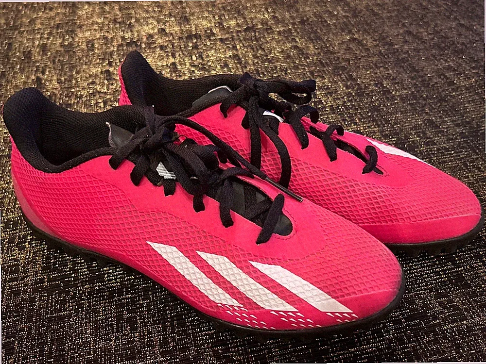 Adidas X Speedportal.4 soccer shoes women’s 7, in a vibrant "Team Shock Pink