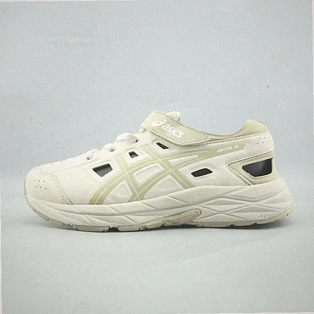 ASICS children's sneakers are a light cream USA 2