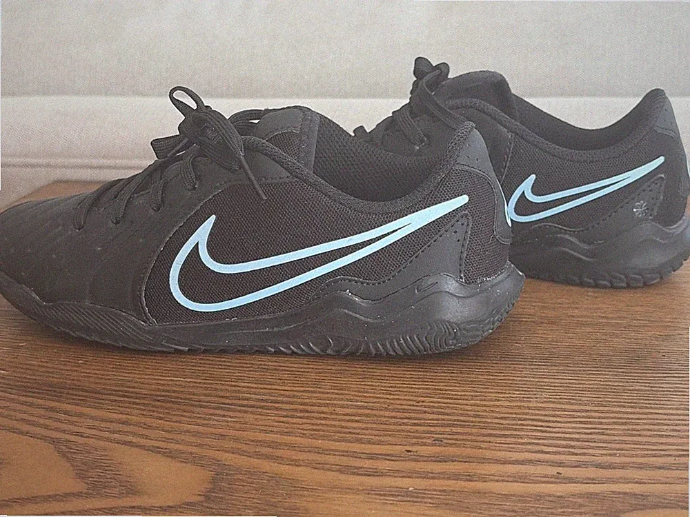 Black and blue size 3.5Y kids indoor soccer cleats, worn twice