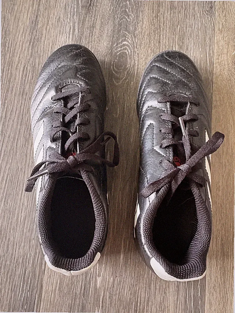 Black, turf soccer cleats. Adidas. Size 4.5 Never been used.