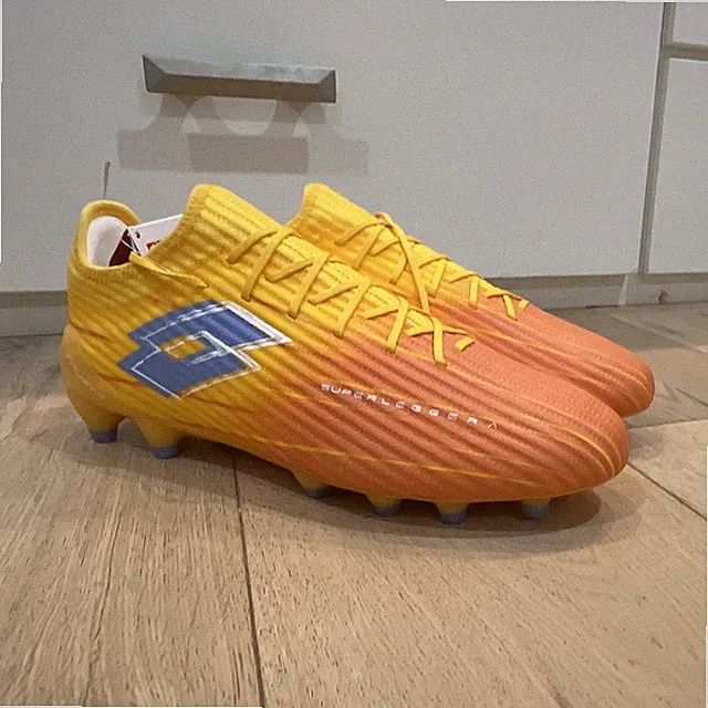 Brand new Lotto Solista 200 IX FG Soccer Cleats