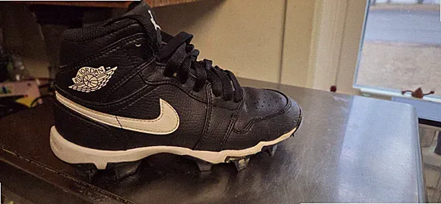 Jordan Youth Mid Top multi sport cleats. Baseball, football, soccer. etc.