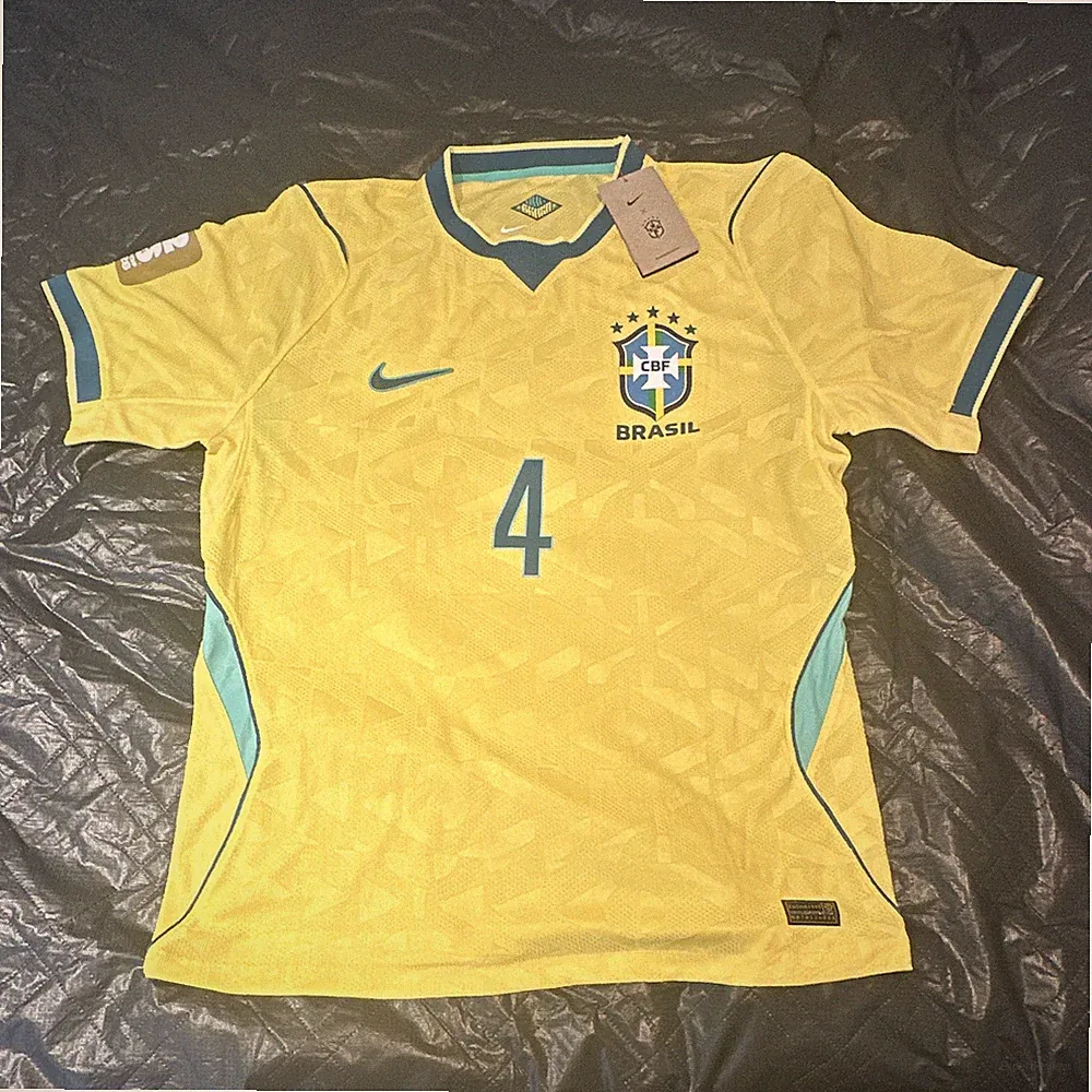 Nike Brazil Marquinhos #4 Soccer Jersey Yellow/Blue FIFA World Cup 2026 XL