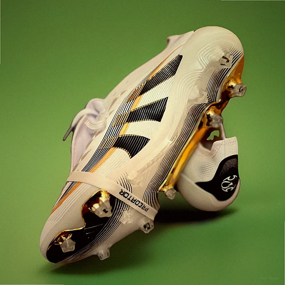 Predator Elite fold-over tongue firm ground cleats. Mens size 10