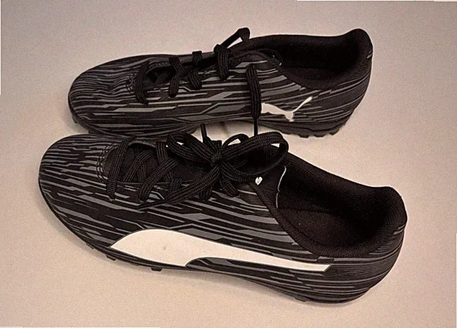 Puma black indoor Soccer Cleats