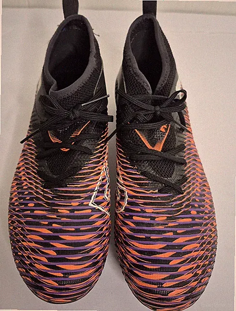 PUMA Future 8 Match soccer cleats in a black and Orange Youth Boys Size 5.5