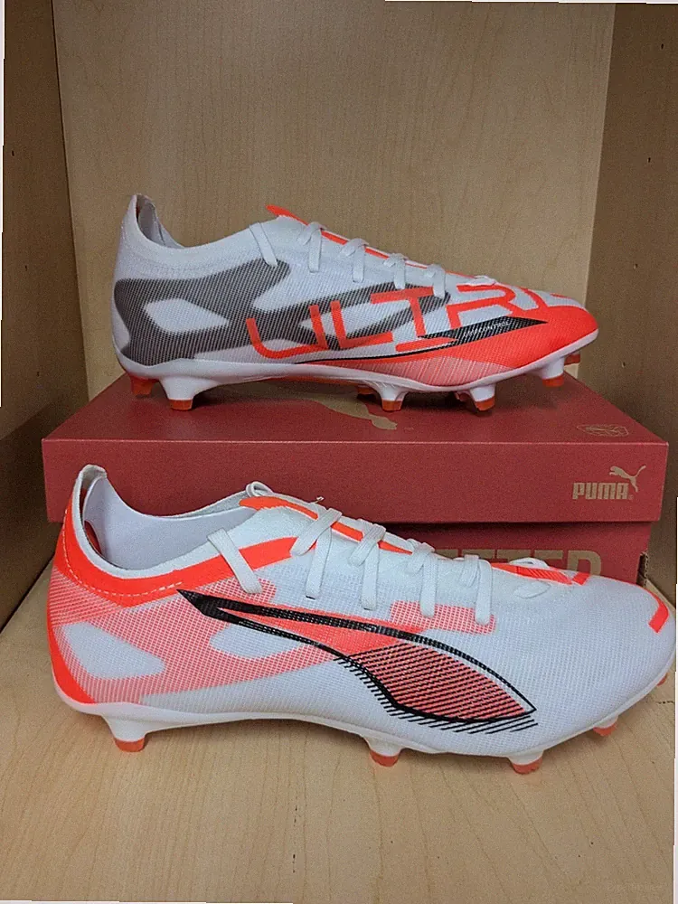 Puma Ultra 5 Match FG/AG Soccer cleat, Whit/Black/Orange, Adult sizes