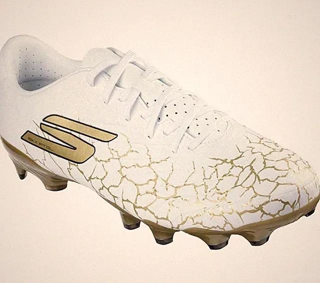 Skechers SKX 1.5 Academy FG soccer cleats in white and gold. Youth Size 4.5