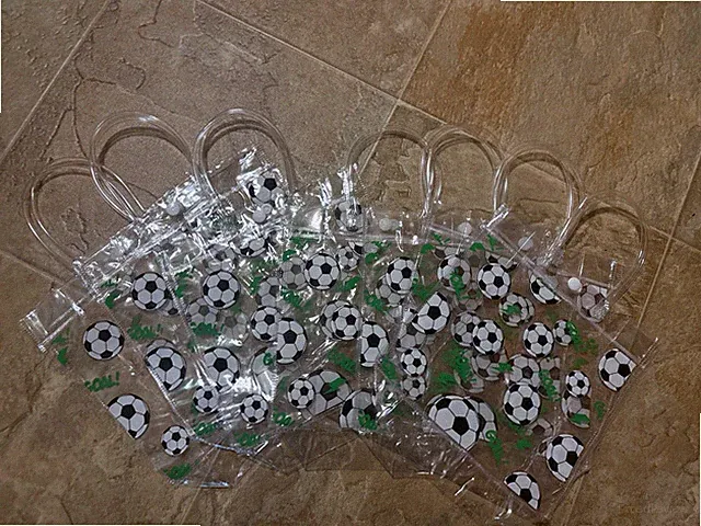 Soccer themed party favor bags with handles. New