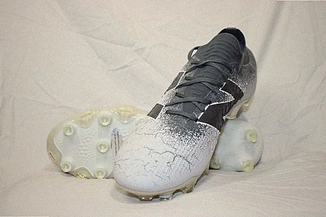 Tekela Pro Low FG V4+ "Grey Day" size 11