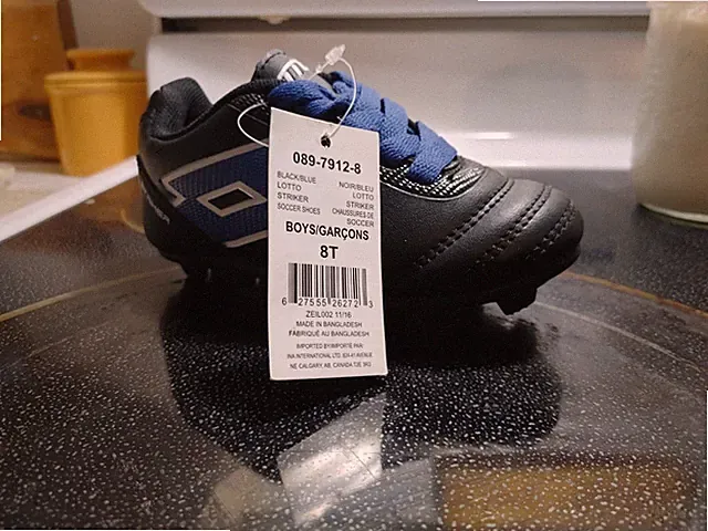 Toddler Soccer Cleats size 8 blue and black, with laces