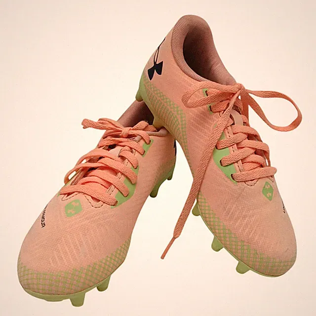 Under Armour 2Y Shadow Turf 3 Jr. Soccer Cleats Pastel Peach w/ Green Bottoms
