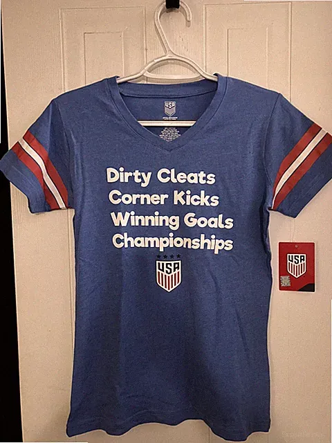 USA SOCCER GIRL’S WORLD CUP USWNT “DIRTY CLEATS” CHAMPIONSHIPS T-SHIRT (Youth)