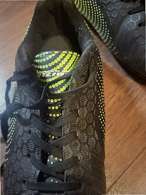 Used Black and Neon Green Soccer Cleats