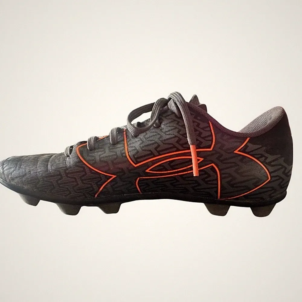 Youth Under Armour Black and Orange Athletic Soccer Cleats